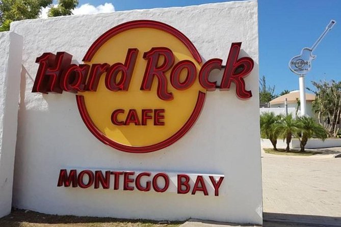 5. Montego Bay Private Highlite Sightseeing, SouvenirShoppingHalfDay Guided Tour - Margaritaville Montego Bay: waterslide, water trampoline, and optional reggae
