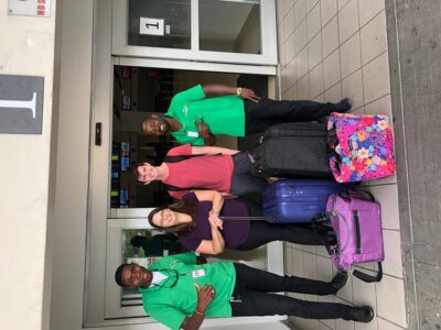 Airport MBJ Round Trip Transfers, to Montego Bay Airbnb & Resorts - Meeting Sangster Airport MBJ: signboard, holding area, and your name match