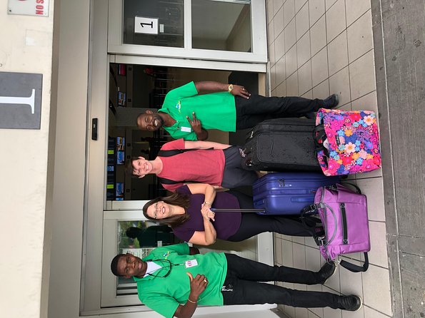 Airport MBJ Round Trip Transfers, to Montego Bay Airbnb & Resorts - Meeting Sangster Airport MBJ: signboard, holding area, and your name match