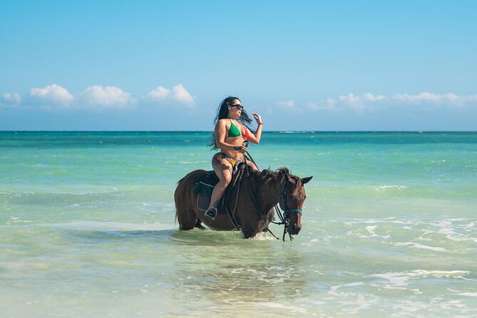 ATV, Bamboo Rafting, Horseback Ride Guided Tour from Montego Bay - Stop 1: St. Ann’s Bay Horseback Ride Plus Ocean Splash