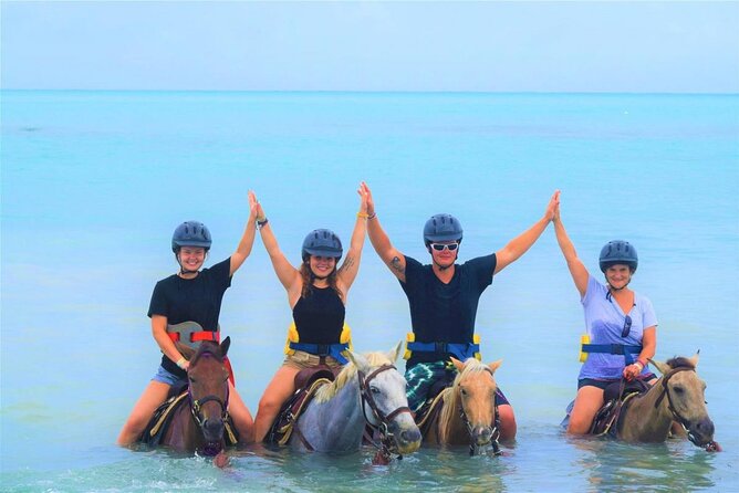 ATV, Zipline, Horseback, Bamboo Rafting & Catamaran Boat Jamaica - Bamboo rafting: slow river time to end on a win