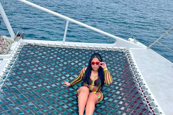 Bamboo Rafting, Catamaran Party Boat & Snorkeling In Montego Bay - Open bar, finger food, and the onboard party rhythm