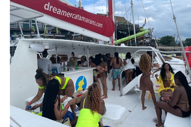 Bamboo Rafting, Catamaran Party Cruise and Snorkeling in Jamaica - Seven Mile Beach catamaran party cruise and included snorkeling