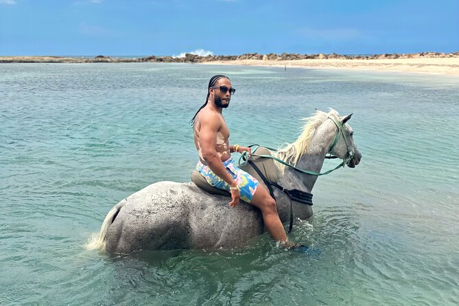 Bamboo Rafting & Horseback Ride n Swim Guided Tour in Montego Bay - The first stop: Braco Stables horseback riding from rainforest to beach