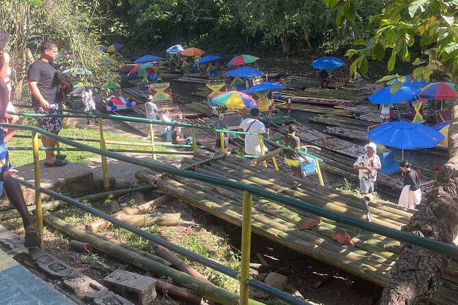 Bamboo Rafting with Limestone Foot massage then Margaritaville. - Great River bamboo rafting on a 32ft raft and the 1820s bridge moment