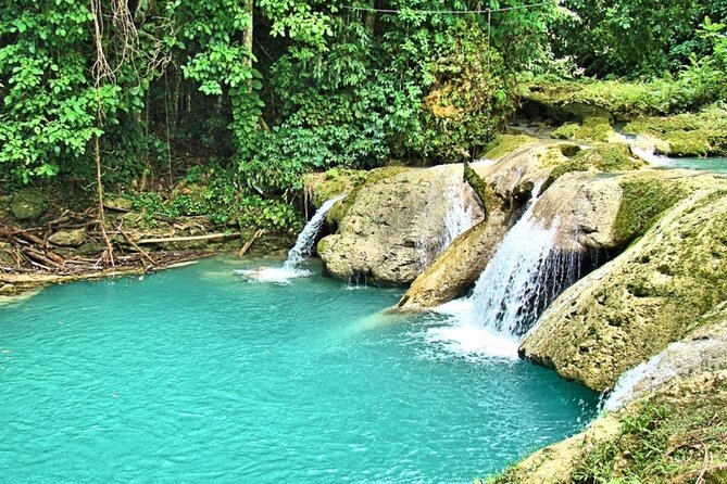 Blue Hole & Konoko Falls Park Combo Tour from Montego Bay - Blue Hole time: sapphire-colored pools, caves, and cliff-jump energy