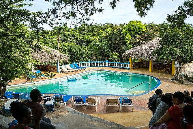 Blue Hole Mineral Spring and Rick's Cafe - Blue Hole Mineral Spring: A big limestone pool and real “let’s play” energy