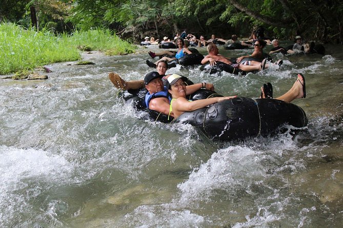 Blue Hole Secret Falls and River Tubing Private Tour - Private tour from Montego Bay: how the A/C ride and guides change the day