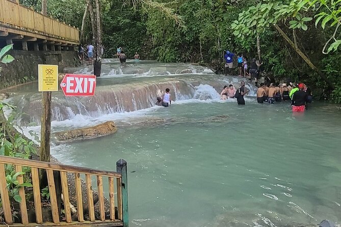Blue Hole, Secret Falls & River Rapids Tubing from Montego Bay - Stop 3: Blue Hole—rope swing or jump-in fresh water