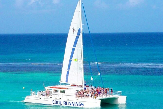 Catamaran Party Cruise and Snorkeling from Montego Bay - Onboard Party Mode: DJ, Snacks, and Unlimited Drinks