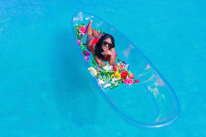 Clear kayak Drone Photo Shoot - The 30-minute flow: posing in a clear kayak with anchors and two guides