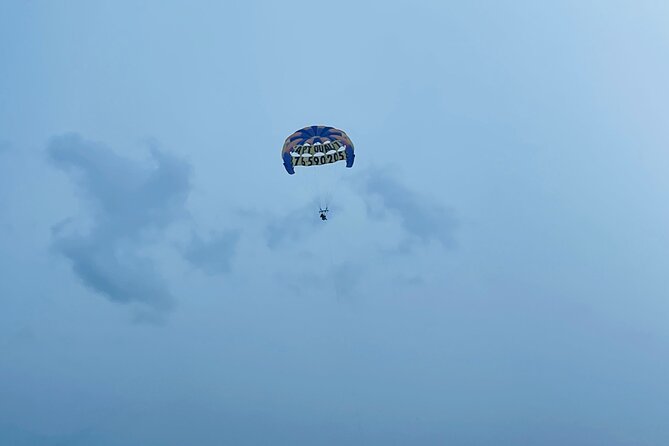 Customized Parasailing & JET-SKI - Parasailing Lift-Off: Shuttle by Small Boat and Flying High