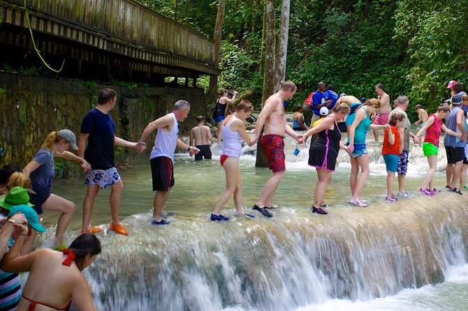 Dunn's River Falls and Blue Hole Adventure from Montego Bay Ja - Stop 1: Blue Hole Swimming, Jumps, and Limestone Caves