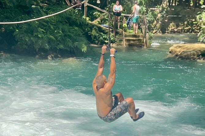Dunn's River Park & Blue Hole Waterfall Combo from Montego Bay - Blue Hole: limestone sinkholes, rope swings, and calm-hidden-water energy