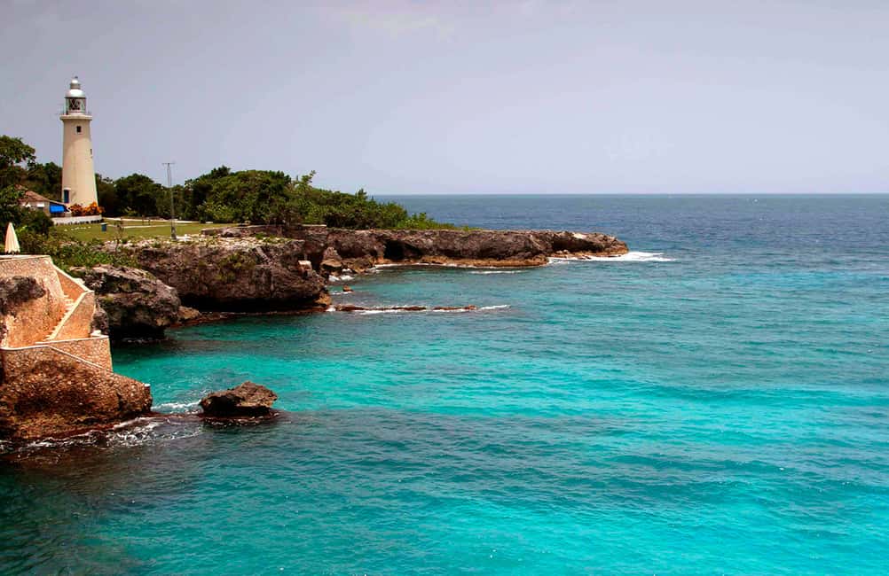 From Montego Bay: Negril Beach & Rick's Cafe Sunset Day Trip - Rick’s Cafe on a 35ft cliff: sunset, reggae energy, and the jump option