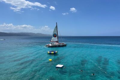 Half Day Catamaran Party Boat, Snorkeling and Hip Strip Tour - The party boat setup: nets, music, and a true wind-in-your-face cruise