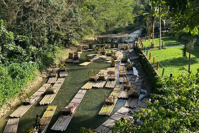 Half-Day Tour Rafting on the Great River with Limestone Foot Massage - Bamboo raft cruising: smooth, scenic, and guide-led