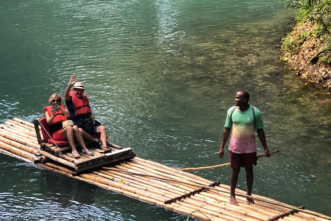 Jamaica Martha Brae Bamboo Rafting with Bus Transportation - Your Private Hour on the River: Captain Guidance, Lifejackets, and Photo Moments
