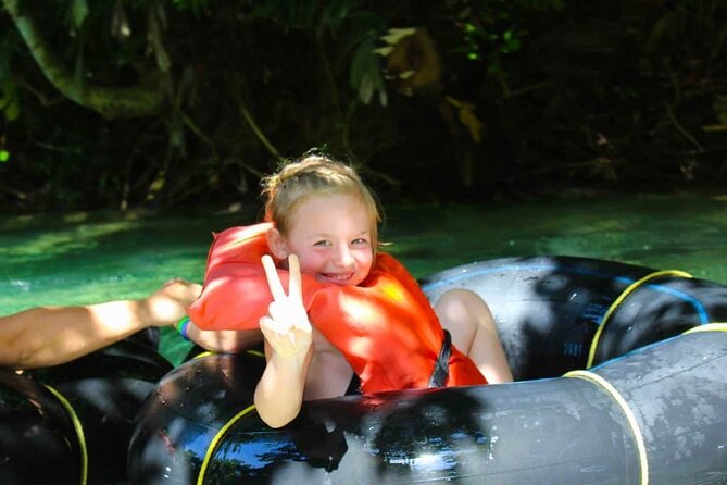 Luminous Lagoon & River Tubing Falmouth from Montego Bay/Falmouth - Swim break and rope swing: the Tarzan-style moment
