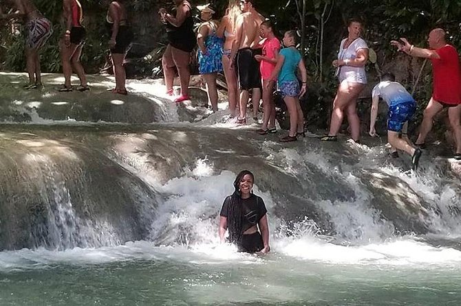 Martha Brae and Dunn’s River Falls Day Tour - Dunn’s River Falls: entry, the arm band, and climbing with a guide