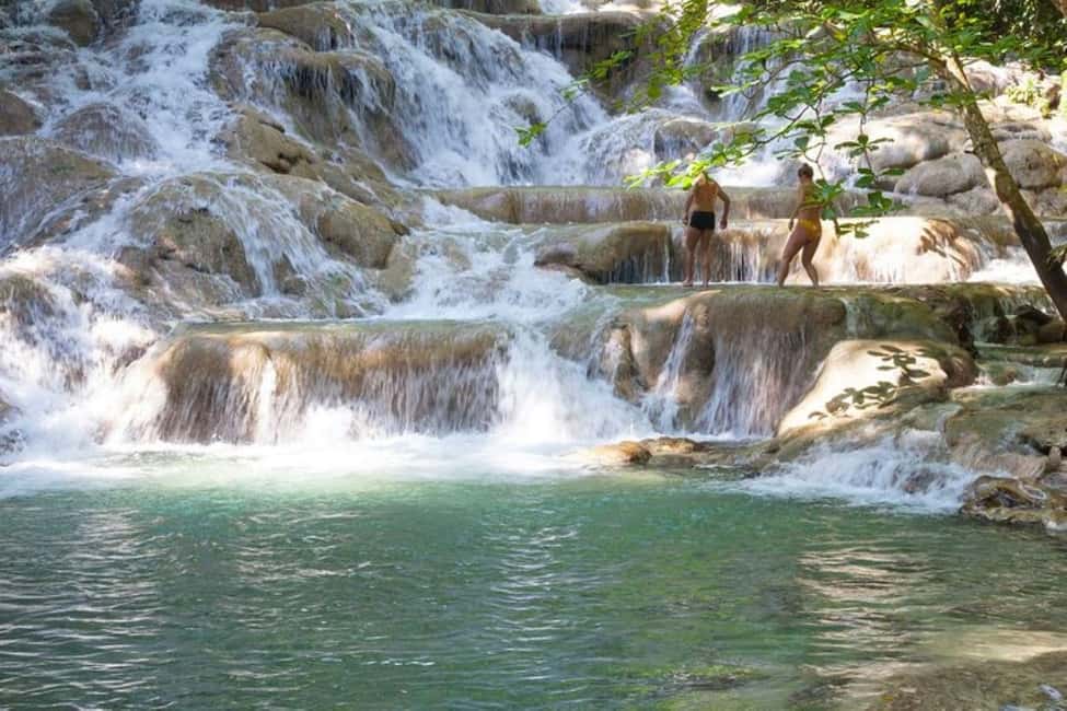 Montego Bay: Chuck Norris Falls & Dunn's River Falls Tour - Chuck Norris Secret Falls: rope swing, pools, and a rainforest hike