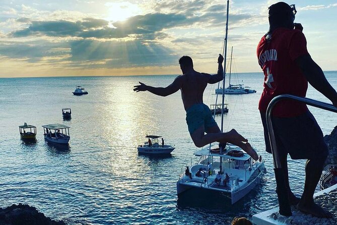 Negril 7 mile Beach, Party Catamaran Cruise , Snorkeling and Ricks Cafe Combo - Stop 2: Rick’s Cafe—music, sunset views, and cliff-jump fun