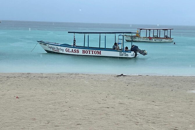 Negril and Ricks Cafe Sunset Tour with Boat Ride and Snorkeling - Stop 1: Jimmy Buffett’s Margaritaville and Seven Mile Beach (4 Hours)