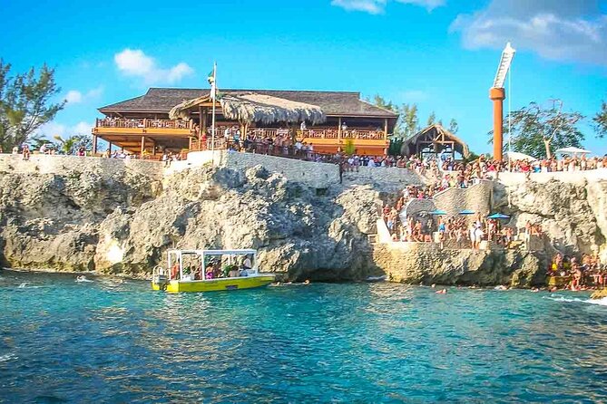 Negril Beach, Ricks Cafe and Margaritaville from Montego Bay - Rick’s Café: cliff-jump action, reggae music, and sunset energy