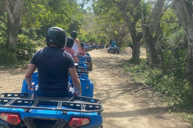 Negril Private Day Tour: ATV Ride, Party Catamaran & Ricks Cafe - Rick’s Cafe at sunset: cliffside entertainment and live music