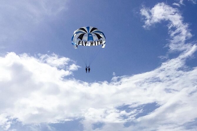Parasailing, Blue Hole Mineral Spring, Seven Mile Beach - Blue Hole Mineral Spring: a real pool setup, not just a lookout