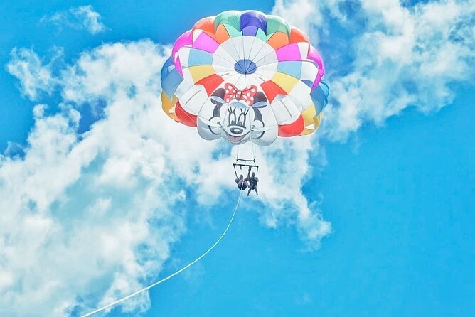 Parasailing, Blue Hole Mineral Spring, Seven Mile Beach - Puerto Seco Beach in Discovery Bay: shallow-water fun for families