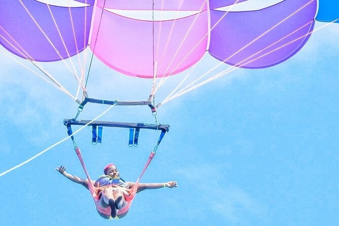 Parasailing, Blue Hole Mineral Spring, Seven Mile Beach - Food stops and money tips: plan for extras beyond the entry fee