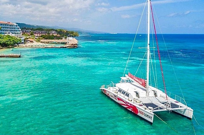 Party Catamaran Cruise with Open Bar and Snorkeling Montego Bay - Cruising Past Montego Bay Views (and That Beach-Party Mood)
