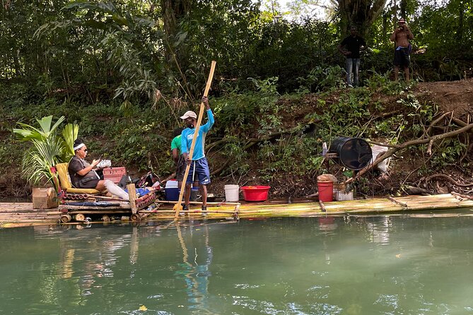 Private Bamboo Rafting, Limestone Massage and Hip Strip Tour - Hip Strip stop in Montego Bay: shopping with a clock on it