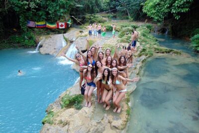 Private Blue Hole & Secret Falls Day Trip plus Shopping from Montego Bay Hotels - Cooling off at the Blue Hole: rainforest water, caves, and rope swings