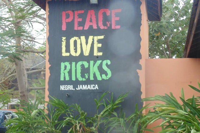 Private Negril Beach & Rick's Cafe Sunset Tour - Stop 1 at Rick’s Cafe: cliff divers, sunset views, and a plan for the best timing
