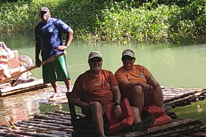 Private River Bamboo Raft with Limestone Foot Massage in Montego Bay - Refreshments and photo moments: coconuts, jerk chicken, rum punch