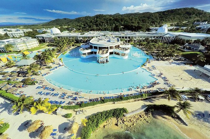 Private Sangster Airport Transfer to Grand Palladium Resort - Vehicle Size and Group Travel Up to 10