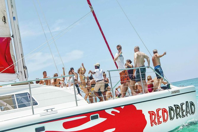 Reggae Catamaran and Snorkeling Open Bar Cruise Montego Bay - Pickup, Tropical Bliss Beach, and Getting Comfortable Fast