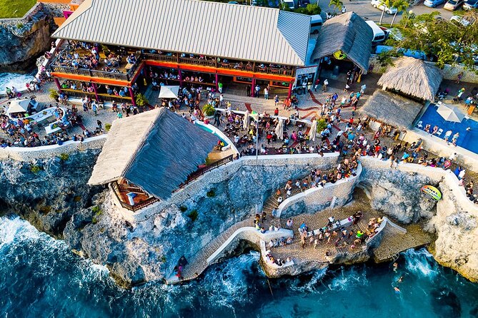 Rick s Café and Seven Mile Beach Private Tour Negril Jamaica - Rick’s Café: Reggae, Ocean Views, and the Famous Cliff-Jump Show