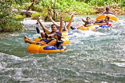 River Rapids Tubing and Beach Visit with Private Transportation - After the Tubes: Kayaks and the Beach Stop